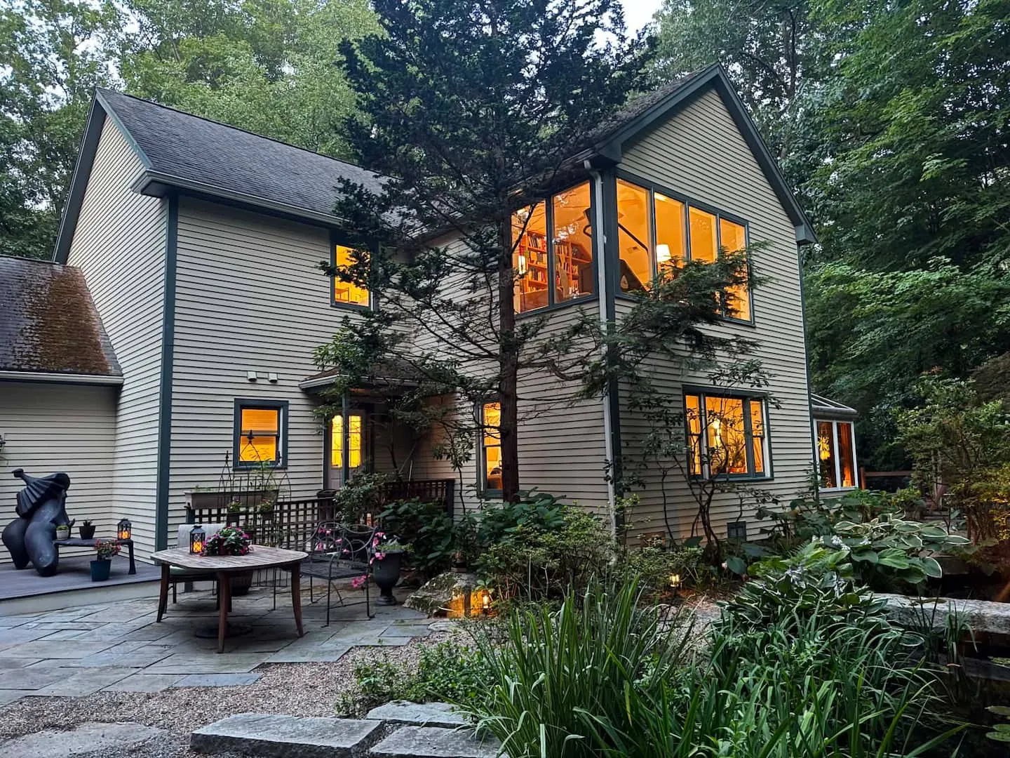 The Southborough retreat at twilight, seen from its garden patio